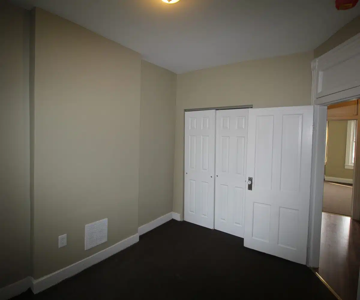 N Luzerne Ave Bedroom with View of Closet Door.
