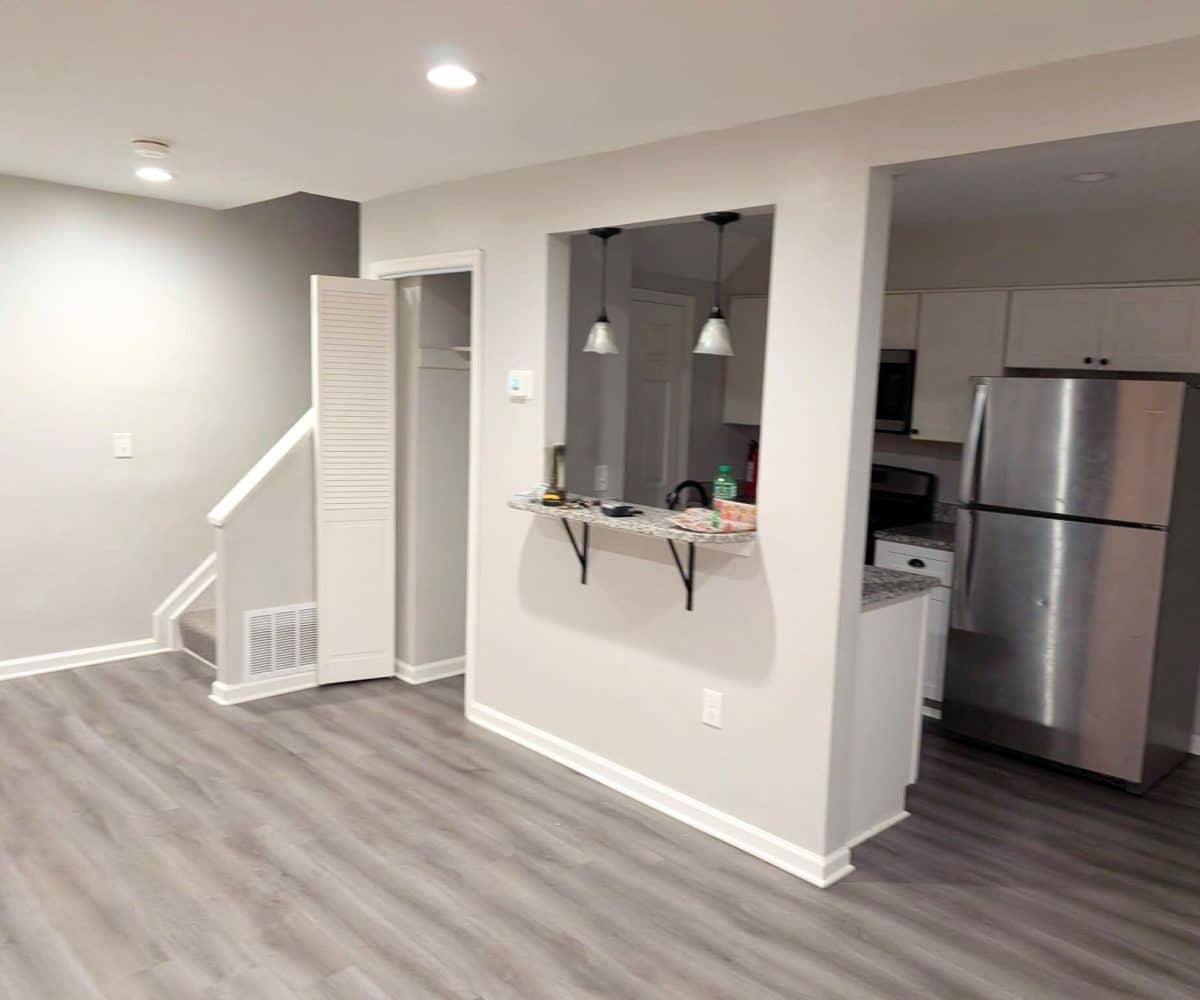 Alameda Townhomes kitchen with stainless steel fridge.