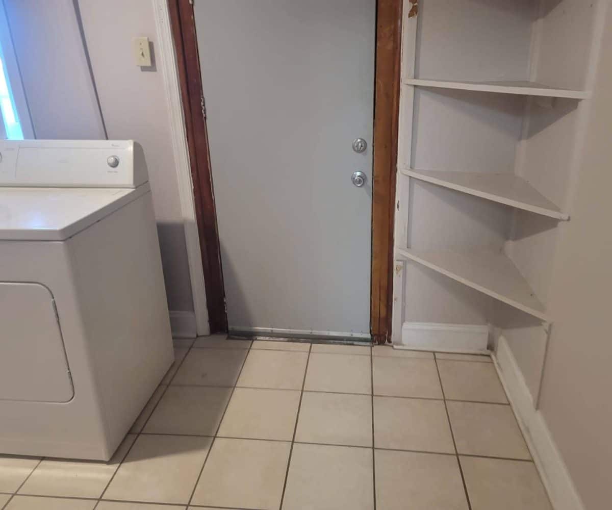 Basement with washing machine.